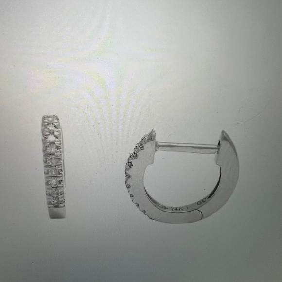 14 Karat white gold and diamond huggy earrings .06 tw - Picture 1 of 4